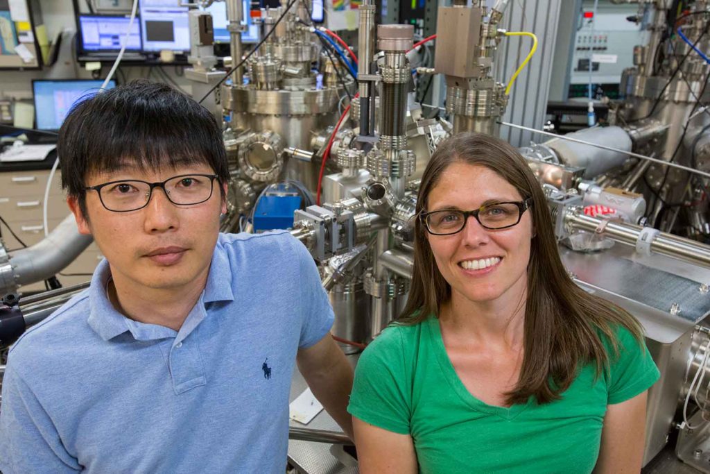 NREL postdoctoral researcher Kwangwook Park, left, and scientist Kirstin Alberi work on the Molecular Beam Epitaxy System at the Solar Energy Research Facility at NREL. (Photo: Courtesy of the National Renewable Energy Laboratory) A discovery by two scientists at the Energy Department’s National Renewabl