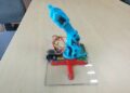 Gesture-Controlled Robotic Arm with Wireless Haptic Feedback