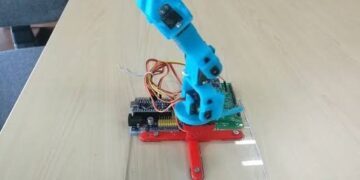 Gesture-Controlled Robotic Arm with Wireless Haptic Feedback